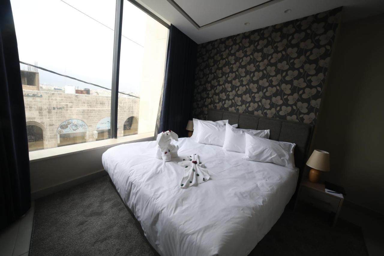 فندق صحارى الخليج Sahara Gulf Hotel Apartments アンマン エクステリア 写真