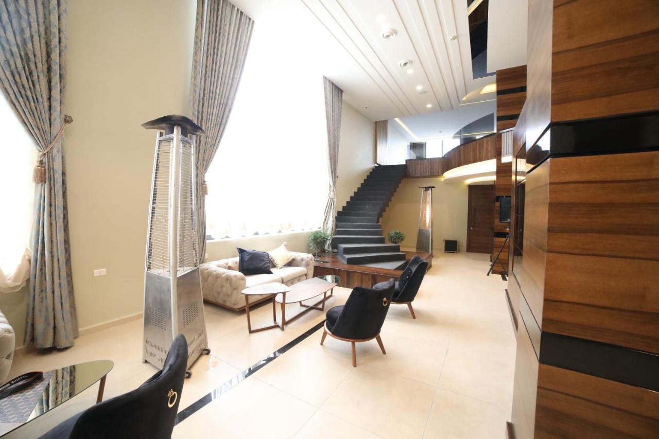 فندق صحارى الخليج Sahara Gulf Hotel Apartments アンマン エクステリア 写真